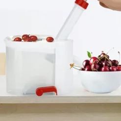 Pressar-Cherry Pitter - Bärbar fruktpryl för att ta bort frön, med behållare, perfekt för hem och resor