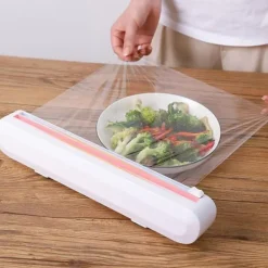 Dispenser och Skärare för Plastfolie