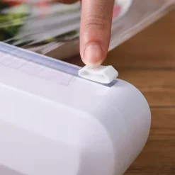 Dispenser och Skärare för Plastfolie