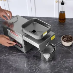 Elektrisk oljepressmaskin, 850 W, rostfritt stål, justerbar temperatur 0-300 ℃ för pressning av jordnötter och sesamfrön.