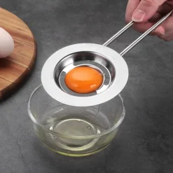 Äggulaseparator i rostfritt stål med justerbart handtag Telescopic