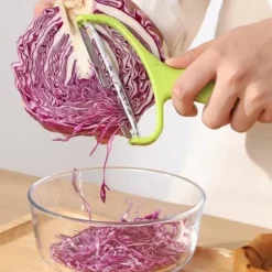 Grönsaks Skalare med Extra Brett Blad