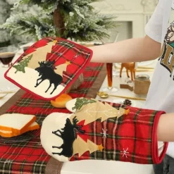 Grytlapp med dekorativt julmotiv