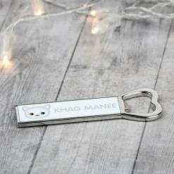 Khao Manee - öppnare med grafik och inskriptionen av varumärket Art-Dog