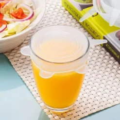 SHOP-STORY - Förpackning med 6 universella expanderbara silikonlock av livsmedelskvalitet för rektangulära eller ovala fyrkantiga behållare