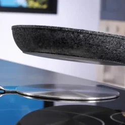 SHOP-STORY - INDUKTIONSOMvandlarskiva: Rostfri adapter för induktionshäll