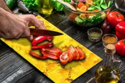 Karottunderlägg-SKÄRBRÄDA I GLAS 52x30 BLOMMOR