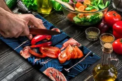 Karottunderlägg-SKÄRBRÄDA I GLAS 52x30 FLAMINGO