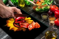 Karottunderlägg-SKÄRBRÄDA I GLASPLATTA 52x40 BLOMMA