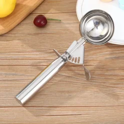 Skopor-Stor kakskopa i rostfritt stål - 6,3 cm diameter